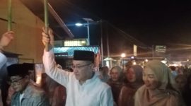 Walikota Sungai Penuh Alfin SH Bersama Ny Sri Kartini Alfin Mengkomandoi Pawai obor 