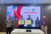 (MoU) dengan Bank Jambi .Walikota Sungai penuh Alfin SH bersama Direktur Utama (Dirut) Bank Jambi H. Khairul Suhairi, SE, MM,.
