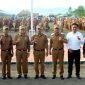 Bupati Kerinci Monadi bersama Wakil Bupati, unsur Forkopimda, kepala OPD, dan jajaran ASN saat apel gabungan di lapangan Kantor Bupati Kerinci, Senin (21/7/2025).