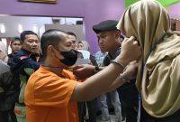 Satreskrim Polres Kerinci saat menggelar rekonstruksi kasus pembunuhan Eli Jumani di Mapolres, Kamis 22 Juli 2025.