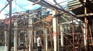 “Kapolsek Kayu Aro meninjau kerusakan Pasar Kersik Tuo.”