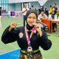 Laura Valensah Fitri, siswi SMA Negeri 1 Solok Selatan, usai meraih juara II pencak silat O2SN Sumatera Barat 2025.
