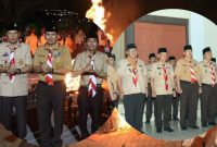 Wawako Azhar memimpin upacara ulang janji HUT ke-64 Pramuka di Lapangan Kantor Wali Kota Sungai Penuh, Rabu malam (13/8)