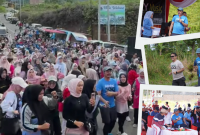 Bupati Kerinci Monadi berjalan bersama masyarakat saat Car Free Day perdana di Jalur Dua Bukit Tengah, Minggu (7/9/2025).