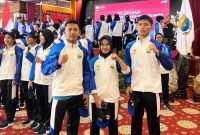 Tiga atlet Kota Sungai Penuh, Welly Putra Wardana, Mujadillah, dan Agustri Nanda, bersiap berangkat ke PON Bela Diri Kudus 2025.