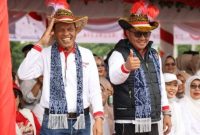 Warga Sungai Penuh tampak antusias menantikan pelantikan pejabat baru yang diharapkan membawa semangat perubahan bagi kemajuan kota.