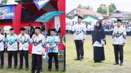 Bupati Monadi memimpin upacara HGN dan HUT PGRI 2025 di Koto Periang (Foto Humas).