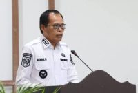 Wakil Wali Kota Sungai Penuh Azhar Hamzah saat membuka workshop penguatan kapasitas multi pihak di Hotel Grand Kerinci.

