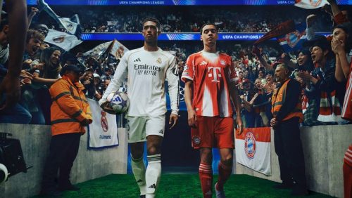 Pemain Real Madrid dan Bayern Munich bersiap memasuki lapangan di tengah sorakan suporter pada pertandingan UEFA Champions League.