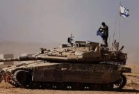 Tembok beton yang dibangun militer Israel terlihat melintasi area dekat Garis Biru di Lebanon selatan. Foto: UNIFIL/AFP