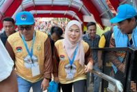 Wali Kota Sungai Penuh Alfin, SH, bersama Ketua TP-PKK Ny. Sri Kartini Alfin menghadiri APEKSI Outlook 2026 di Kota Bandar Lampung, Sabtu (21/12).