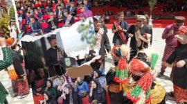 Suasana pembukaan Festival Budaya Kerinci 2025 di tepian Danau Kerinci menampilkan prosesi adat, barisan hulubalang, serta keramaian masyarakat yang memenuhi area dermaga.