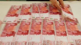 Ilustrasi mata uang dari berbagai negara yang masuk daftar mata uang terlemah di dunia berdasarkan nilai tukar terhadap dolar AS pada 2026.