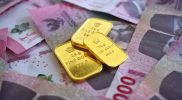 Ilustrasi emas Antam 24 karat dengan harga terbaru per gram dan buyback