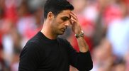 Gambar Mikel Arteta di pinggir lapangan saat memimpin Arsenal menghadapi pertandingan Liga Inggris, dengan latar stadion dan suporter.