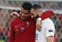 Cristiano Ronaldo dan Karim Benzema. (Foto: POOL/AFP via Getty Images/FRANCK FIFE)