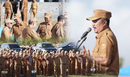 Bupati Kerinci Monadi memimpin apel perdana ASN pasca Idulfitri di lapangan kantor.