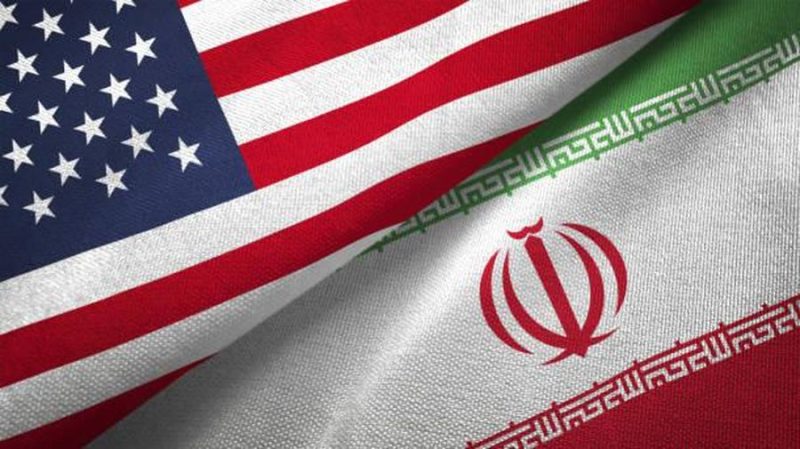 Foto: Ilustrasi bendera Amerika Serikat dan Iran. (iStockphoto/studiocasper)