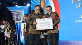 Wali Kota Sungai Penuh Alfin menerima penghargaan nasional penurunan stunting dan insentif fiskal Rp3 miliar di Palembang.