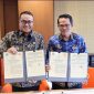 Wali Kota Sungai Penuh Alfin, SH bersama Rektor UNJA Prof. Dr. Helmi, SH., MH menandatangani MoU kerja sama pengembangan pendidikan, penelitian, dan pengabdian masyarakat di Gedung Auditorium UNIFAC.