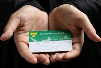 Ilustrasi kartu BPJS Kesehatan dan layanan rumah sakit di Indonesia