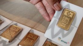 Ilustrasi emas batangan Antam dengan harga terbaru yang mengalami kenaikan pada perdagangan hari ini.