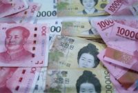 Ilustrasi layar perdagangan yang menampilkan nilai tukar mata uang Asia terhadap dolar AS.