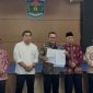 Foto bersama Pemerintah Kota Sungai Penuh dan Perumda Tirta Khayangan ( Foto iNBrita.com )