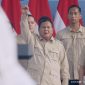 Prabowo Subianto berpidato saat peringatan Hari Buruh 2026 di Monas, Jakarta, menyoroti potongan tarif ojol