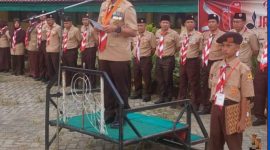 Sekda Kota Sungai Penuh Alpian membuka Jambore Cabang Pramuka Tahun 2026 di Bumi Perkemahan SMKN 4 Sungai Penuh, Jumat (29/5/2026). (Foto:  Prokopin)