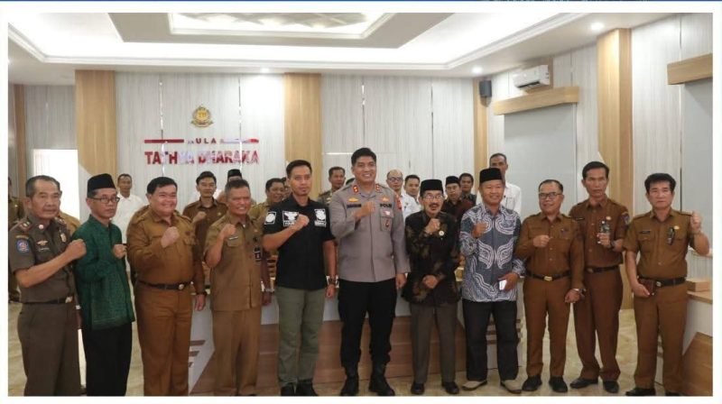 Petugas Densus 88 bersama pemerintah daerah saat sosialisasi penerapan kotak amal berbasis QR barcode di Aula Mapolres Kerinci, Selasa (12/5/2026).