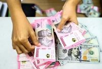 Pergerakan rupiah menunjukkan penguatan tipis terhadap dolar AS pada perdagangan Kamis pagi
