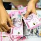 Pergerakan rupiah menunjukkan penguatan tipis terhadap dolar AS pada perdagangan Kamis pagi