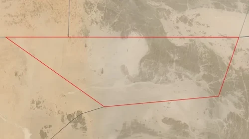 Wilayah Bir Tawil di perbatasan Mesir dan Sudan dikenal sebagai kawasan tak bertuan yang dipenuhi gurun dan aktivitas tambang emas.