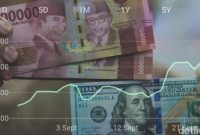 Ilustrasi pergerakan kurs dolar AS yang menguat terhadap rupiah di pasar valuta asing.(Ilustrasi/Foto: Andhika Prasetia)