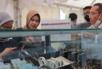 Daftar harga emas Galeri 24, Antam, UBS, dan Antam Retro yang turun pada 23 Mei 2026.