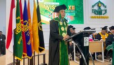 Rektor IAIN Kerinci, Dr. Jafar Ahmad, menyampaikan sambutan pada Wisuda Sarjana dan Pascasarjana Angkatan XII, Kamis (18/6/2026).