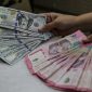 ilustrasi kurs rupiah terhadap dollar AS.(ANTARA FOTO/Darryl Ramadhan)