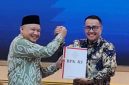 Walikota Alfin menerima LHP dan Opini WTP dari BPK RI Perwakilan Jambi.( Foto Prokopin)