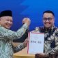 Walikota Alfin menerima LHP dan Opini WTP dari BPK RI Perwakilan Jambi.( Foto Prokopim)