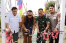 Wako Alfin meresmikan Jembatan Perintis Garuda di Desa Mekar Jaya, Kecamatan Tanah Kampung, Senin (22/6/2026).