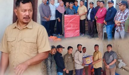 Bupati Monadi menyerahkan bantuan kepada korban kebakaran di dua desa di Kabupaten Kerinci