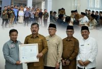 Penyerahan Sertifikat Indikasi Geografis (IG) Beras Payo Koerintji di Aula Kantor Bupati Kerinci. ( Foto Kerinci Satu)
