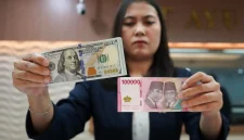 Ilustrasi pergerakan nilai tukar rupiah terhadap dolar AS ( Foto Tribune wa.com)