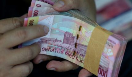 Ilustrasi pergerakan nilai tukar rupiah melemah terhadap dolar AS