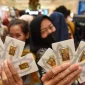 Ilustrasi emas batangan Antam dengan harga terbaru yang mengalami kenaikan pada perdagangan Jumat pagi.( FOTO : Indrianto Eko Suwarso/wpa/am. )