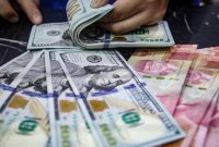 Gubernur Bank Indonesia Perry Warjiyo menyampaikan kebijakan terbaru pembatasan pembelian dolar AS dalam konferensi pers Rapat Dewan Gubernur, Jakarta, Kamis (18/6/2026).(Foto: Andhika Prasetia/detikFoto)