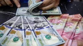 Gubernur Bank Indonesia Perry Warjiyo menyampaikan kebijakan terbaru pembatasan pembelian dolar AS dalam konferensi pers Rapat Dewan Gubernur, Jakarta, Kamis (18/6/2026).(Foto: Andhika Prasetia/detikFoto)