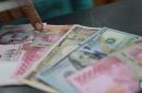 Mayoritas mata uang Asia melemah terhadap dolar AS di tengah meningkatnya permintaan aset safe haven akibat konflik Timur Tengah.(Foto : CNBC Indonesia/Muhammad Sabki)