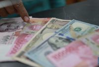 Mayoritas mata uang Asia melemah terhadap dolar AS di tengah meningkatnya permintaan aset safe haven akibat konflik Timur Tengah.(Foto : CNBC Indonesia/Muhammad Sabki)